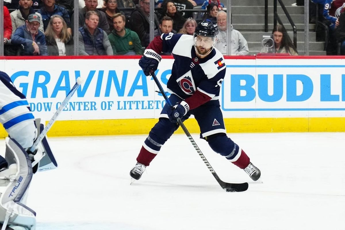 Dec 7, 2023; Denver, Colorado, USA; Colorado Avalanche left wing Tomas Tatar (90) shoots the puck in the second period against the Winnipeg Jets at Ball Arena.