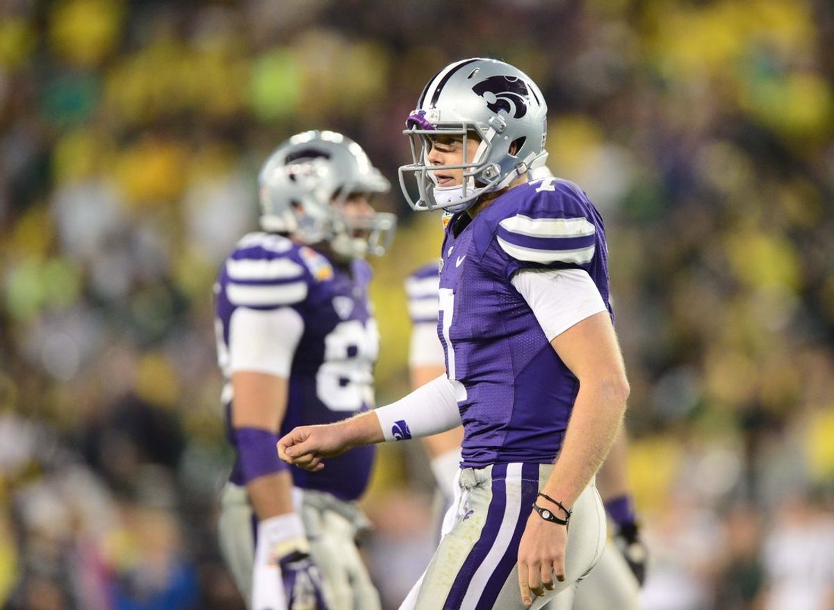 Jan. 3, 2013; Glendale, AZ, USA: Kansas State Wildcats quarterback Collin Klein (7) against the Oregon Ducks during the 2013 Fiesta Bowl at University of Phoenix Stadium. Oregon defeated Kansas State 35-17. Mandatory Credit: Mark J. Rebilas-Imagn Images