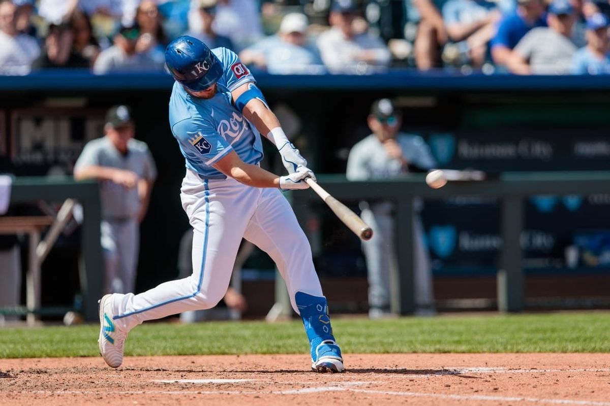 Apr 7, 2024; Kansas City, Missouri, USA; Kansas City Royals outfielder Hunter Renfroe (16) hits a home run during the fifth inning against the Chicago White Sox at Kauffman Stadium.