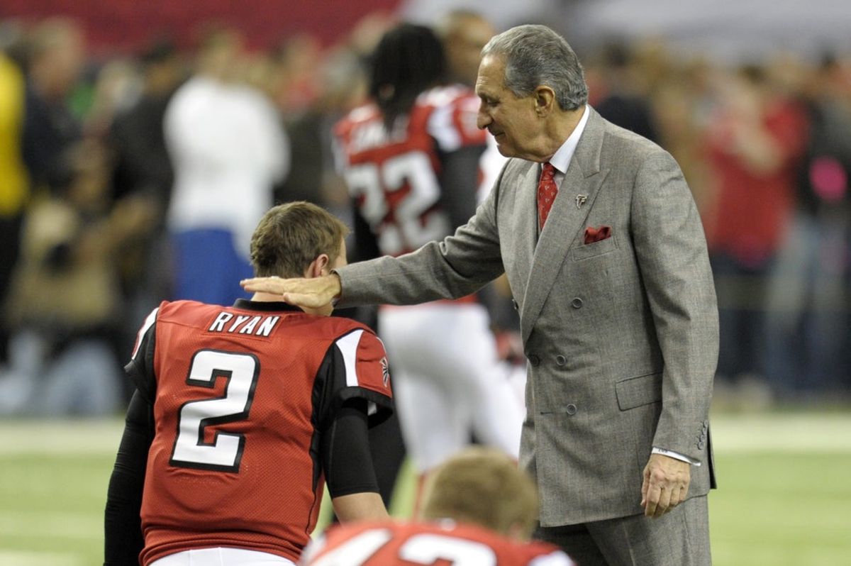 (File photo) Atlanta Falcons owner Arthur Blank talks with quarterback Matt Ryan prior to the 2013 NFC Championship game against the San Francisco 49ers at the Georgia Dome. Mandatory Credit: Dale Zanine-Imagn Images