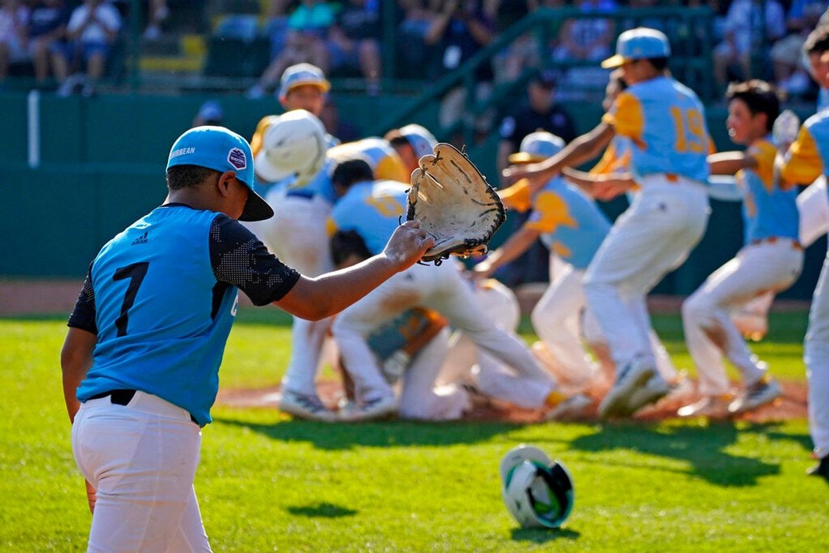 Some kids celebrate winning a game or whatever. Meanwhile, another kid is mad about losing a game or whatever. It’s great that they’re having fun, but get this off ESPN.