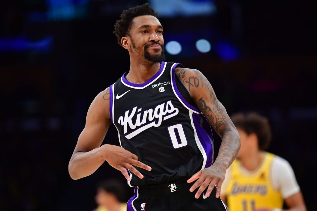 Mar 6, 2024; Los Angeles, California, USA;  Sacramento Kings guard Malik Monk (0) reacts after scoring a three point basket against the against the Los Angeles Lakers during the second half at Crypto.com Arena.