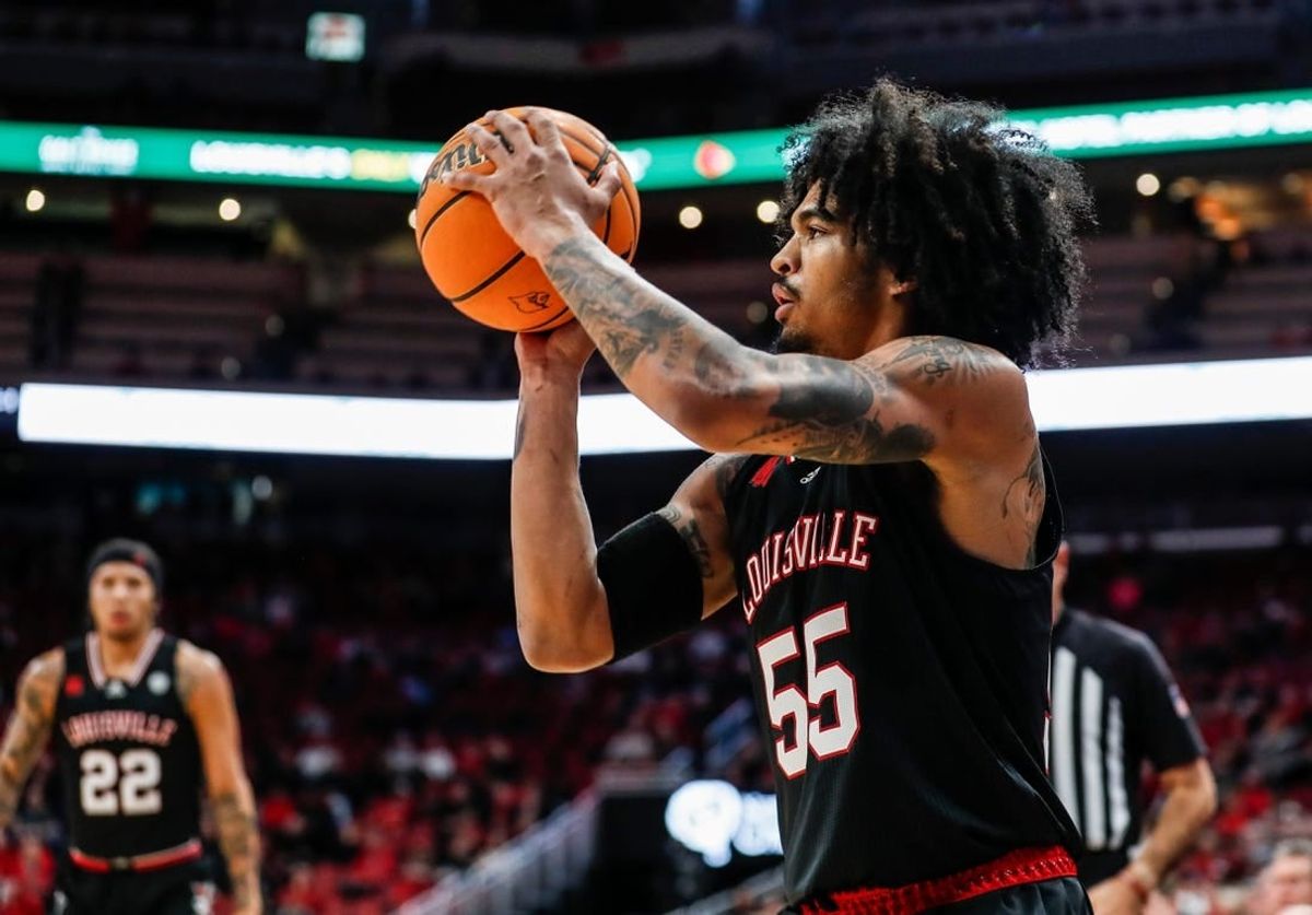 Louisville Cardinals guard Skyy Clark (55) takes a three-point shot against Bellarmine on Nov. 29, 2023