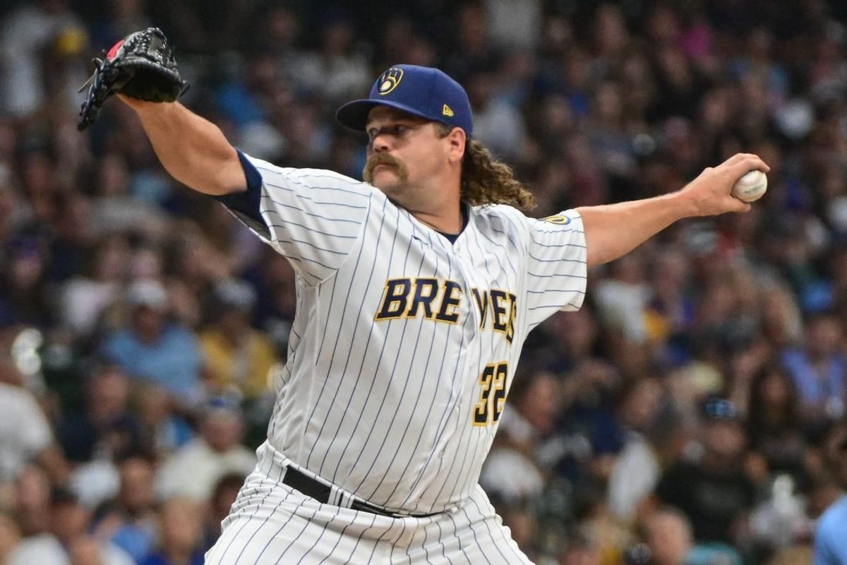 Aug 5, 2023; Milwaukee, Wisconsin, USA;  Milwaukee Brewers pitcher Andrew Chafin (32) pitches against the Pittsburgh Pirates in the eighth inning at American Family Field.