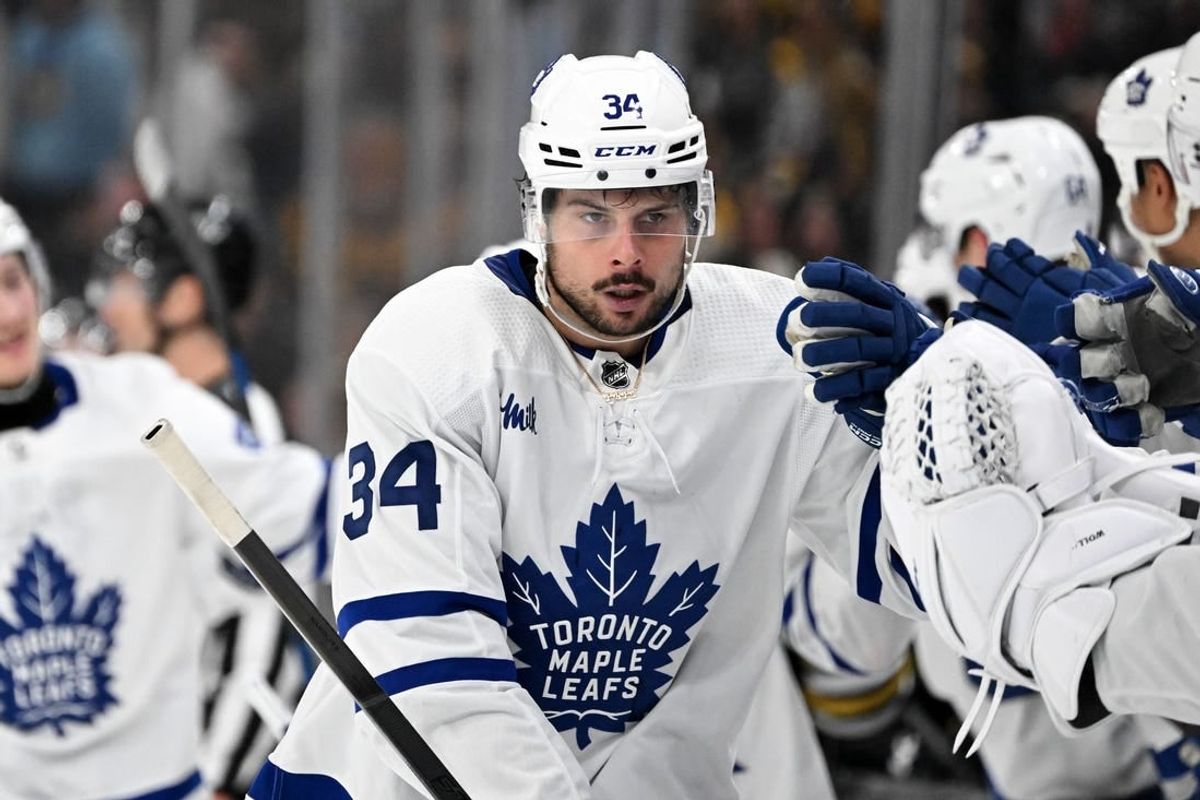 Apr 22, 2024; Boston, Massachusetts, USA; Toronto Maple Leafs center Auston Matthews (34) celebrates with his teammates after scoring a goal against the Boston Bruins during the third period in game two of the first round of the 2024 Stanley Cup Playoffs at TD Garden.