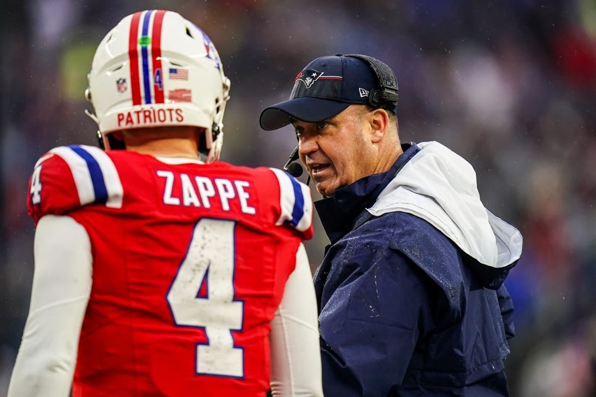 Dec 3, 2023; Foxborough, Massachusetts, USA; New England Patriots offensive coordinator Bill O'Brien talks with quarterback Bailey Zappe (4) as they take on the Los Angeles Chargers in the second quarter at Gillette Stadium.