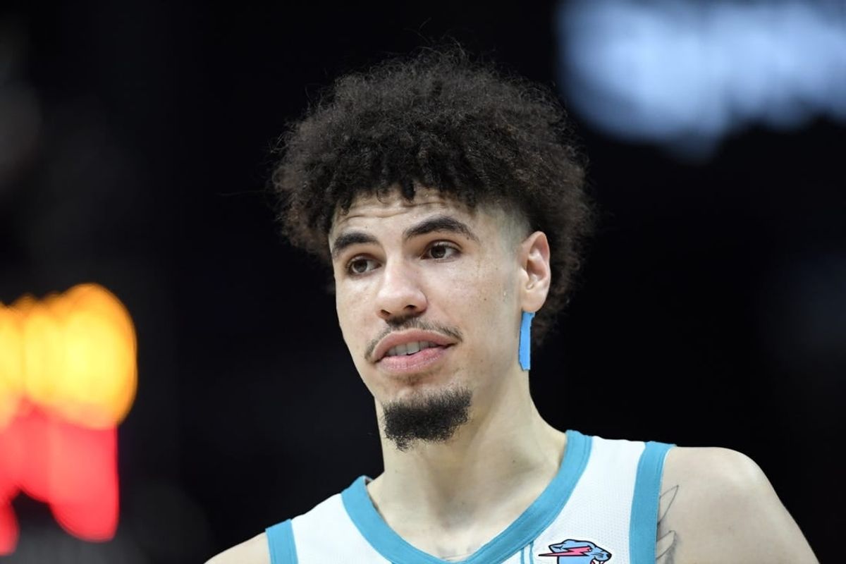 Nov 22, 2023; Charlotte, North Carolina, USA; Charlotte Hornets guard LaMelo Ball (1) looks on during a time out in the second half against the Washington Wizards at the Spectrum Center.
