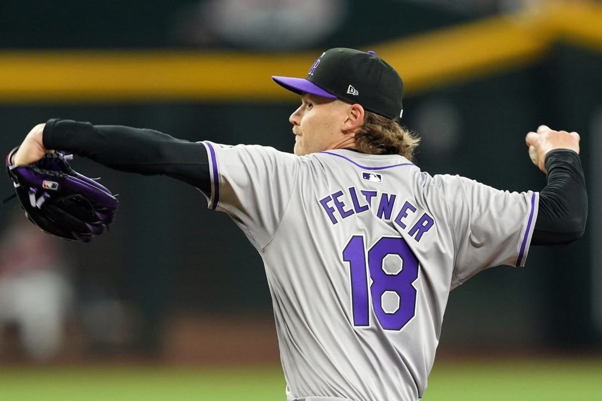 Mar 31, 2024; Phoenix, Arizona, USA; Colorado Rockies starting pitcher Ryan Feltner (18) pitches against the Arizona Diamondbacks during the first inning at Chase Field.