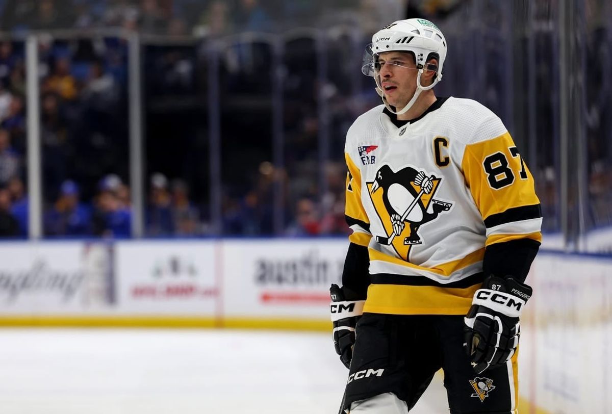 Nov 24, 2023; Buffalo, New York, USA;  Pittsburgh Penguins center Sidney Crosby (87) during a stoppage in play against the Buffalo Sabres in the third period at KeyBank Center.