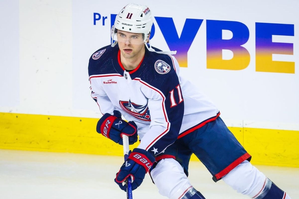 Jan 25, 2024; Calgary, Alberta, CAN; Columbus Blue Jackets center Adam Fantilli (11) skates during the warmup period against the Calgary Flames at Scotiabank Saddledome.