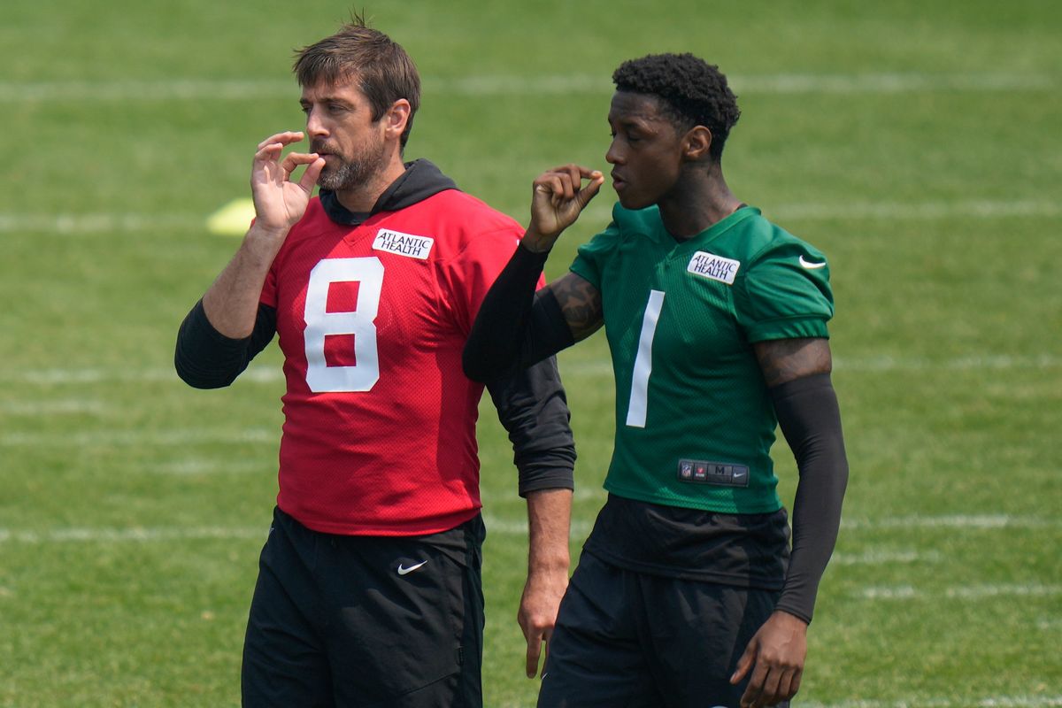 Aaron Rodgers and Sauce Gardner