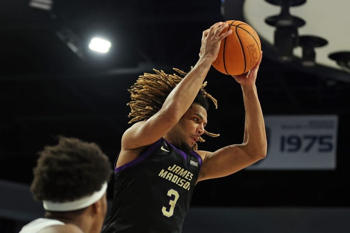 Dec 9, 2023; Norfolk, Virginia, USA; James Madison Dukes forward T.J. Bickerstaff (3) grabs a rebound against the Old Dominion Monarchs at Chartway Arena at the Ted Constant Convocation Center.