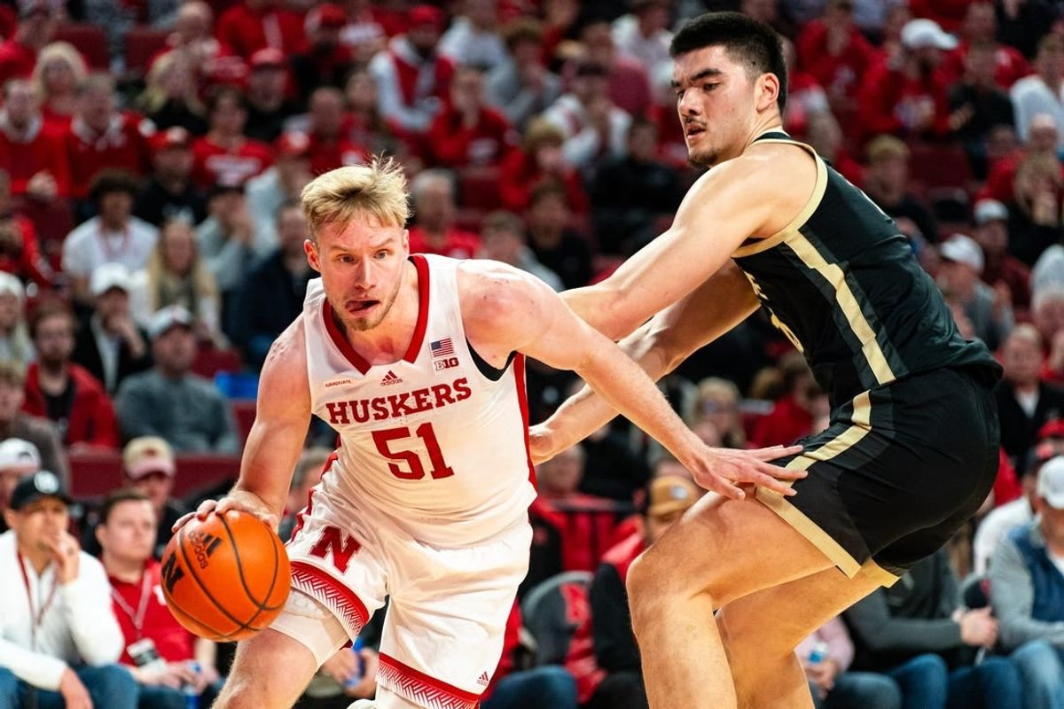 Jan 9, 2024; Lincoln, Nebraska, USA; Nebraska Cornhuskers forward Rienk Mast (51) drives against Purdue Boilermakers center Zach Edey (15) during the first half at Pinnacle Bank Arena.