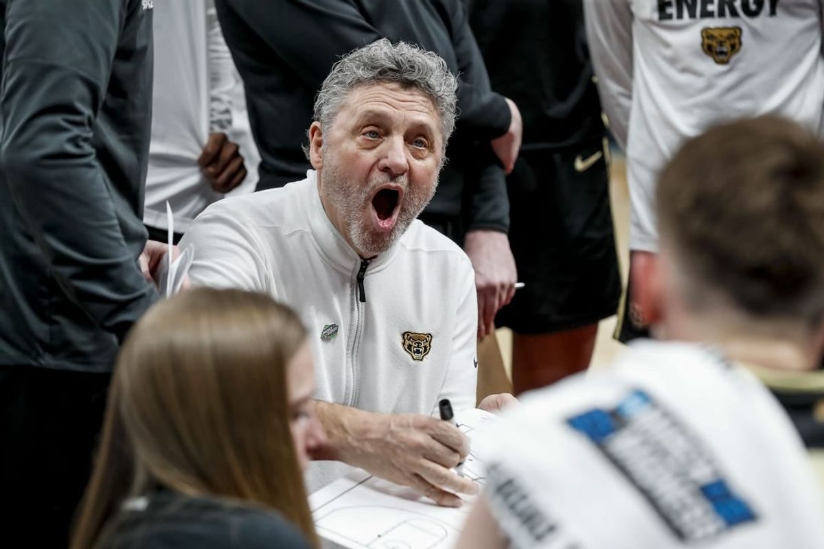 Mar 21, 2024; Pittsburgh, PA, USA; Oakland Golden Grizzlies head coach Greg Kampe reacts to a play during the second half in the first round of the 2024 NCAA Tournament at PPG Paints Arena.