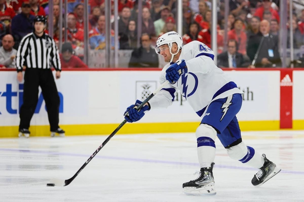 Apr 23, 2024; Sunrise, Florida, USA; Tampa Bay Lightning defenseman Darren Raddysh (43) shoots the puck against the Florida Panthers during the first period in game two of the first round of the 2024 Stanley Cup Playoffs at Amerant Bank Arena.
