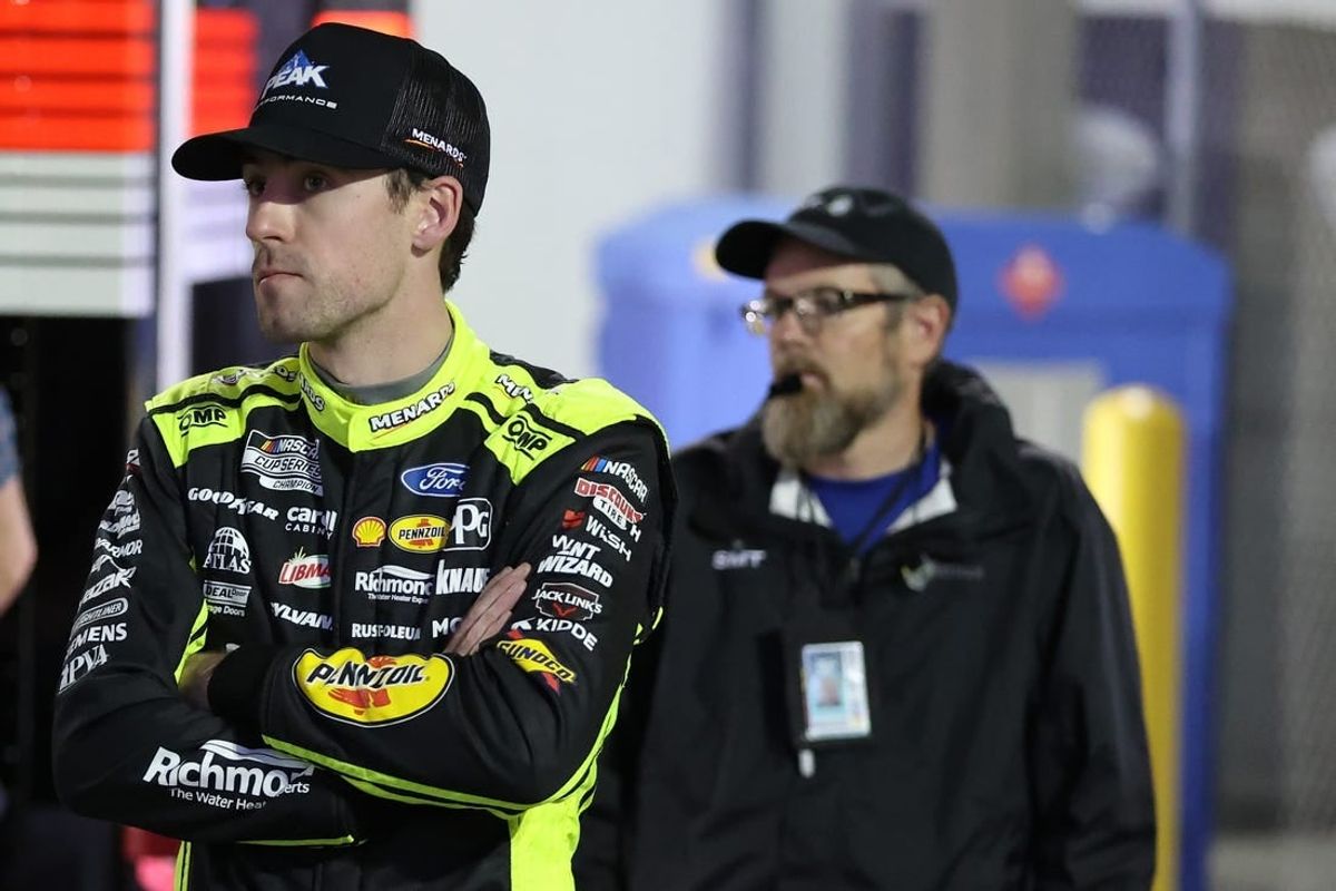 Feb 15, 2024; Daytona Beach, Florida, USA; NASCAR Cup Series driver Ryan Blaney (12) in the garage area after wrecking during the Bluegreen Vacations Duel 2 at Daytona International Speedway.