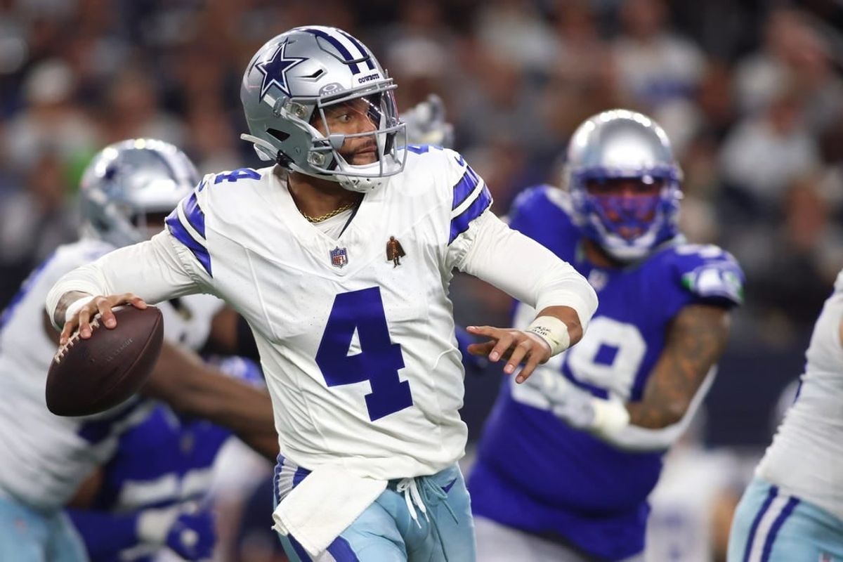 Nov 30, 2023; Arlington, Texas, USA; Dallas Cowboys quarterback Dak Prescott (4) throws a pass against the Seattle Seahawks during the second half at AT&T Stadium.
