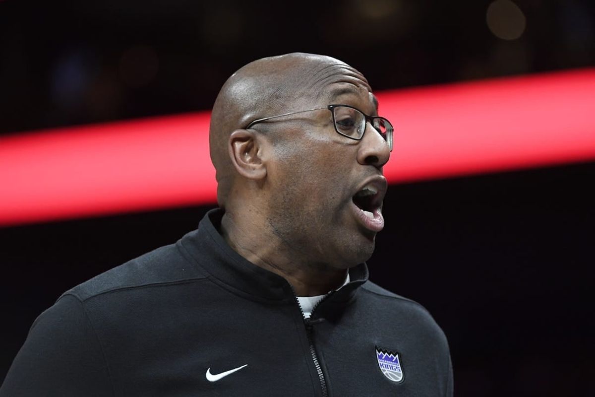 Jan 10, 2024; Charlotte, North Carolina, USA; Sacramento Kings head coach Mike Brown reacts during the first half against the Charlotte Hornets at the Spectrum Center.