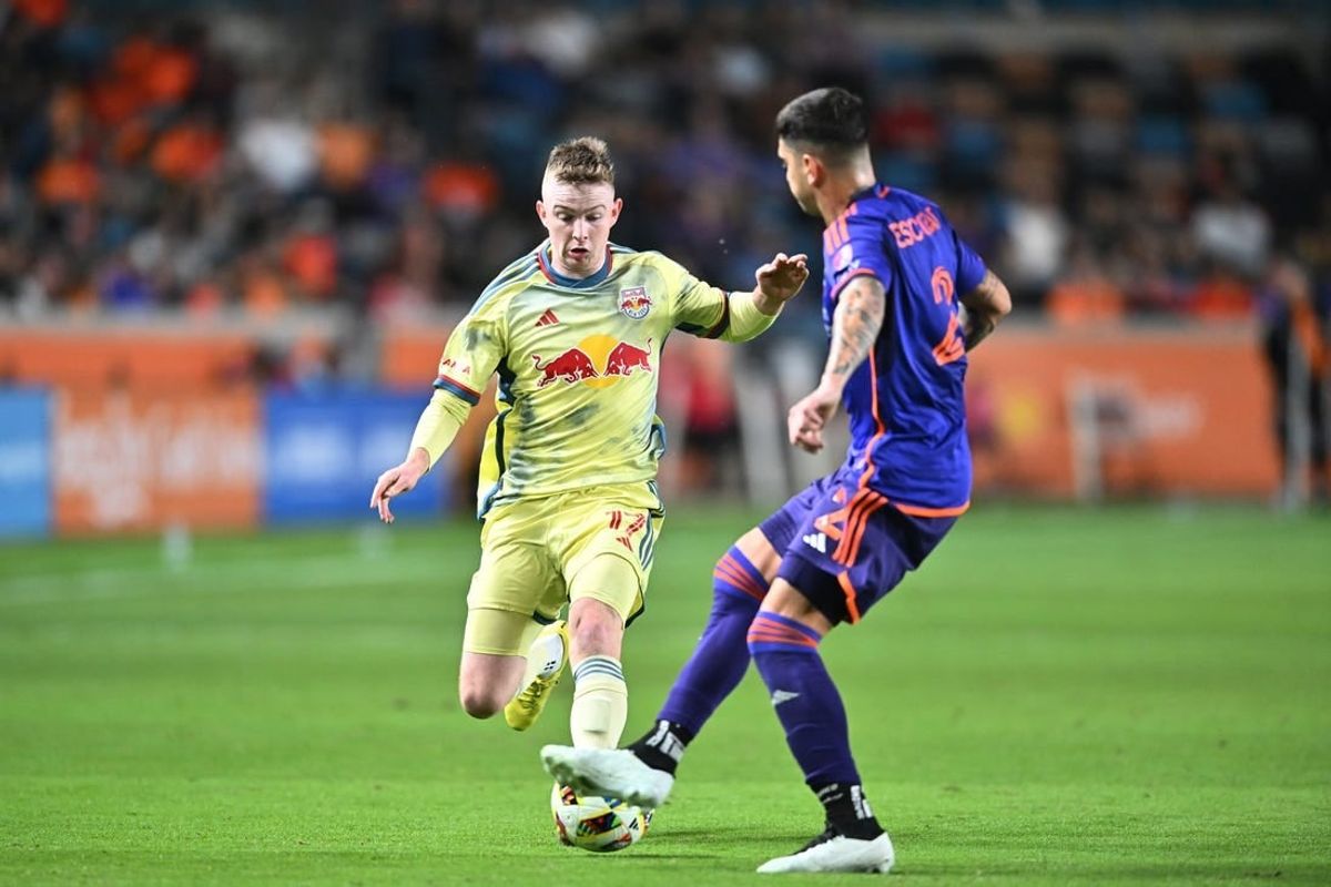 Mar 2, 2024; Houston, Texas, USA; New York Red Bulls midfielder Cameron Harper (17) dribbles the ball in the second half against Houston Dynamo FC at Shell Energy Stadium.