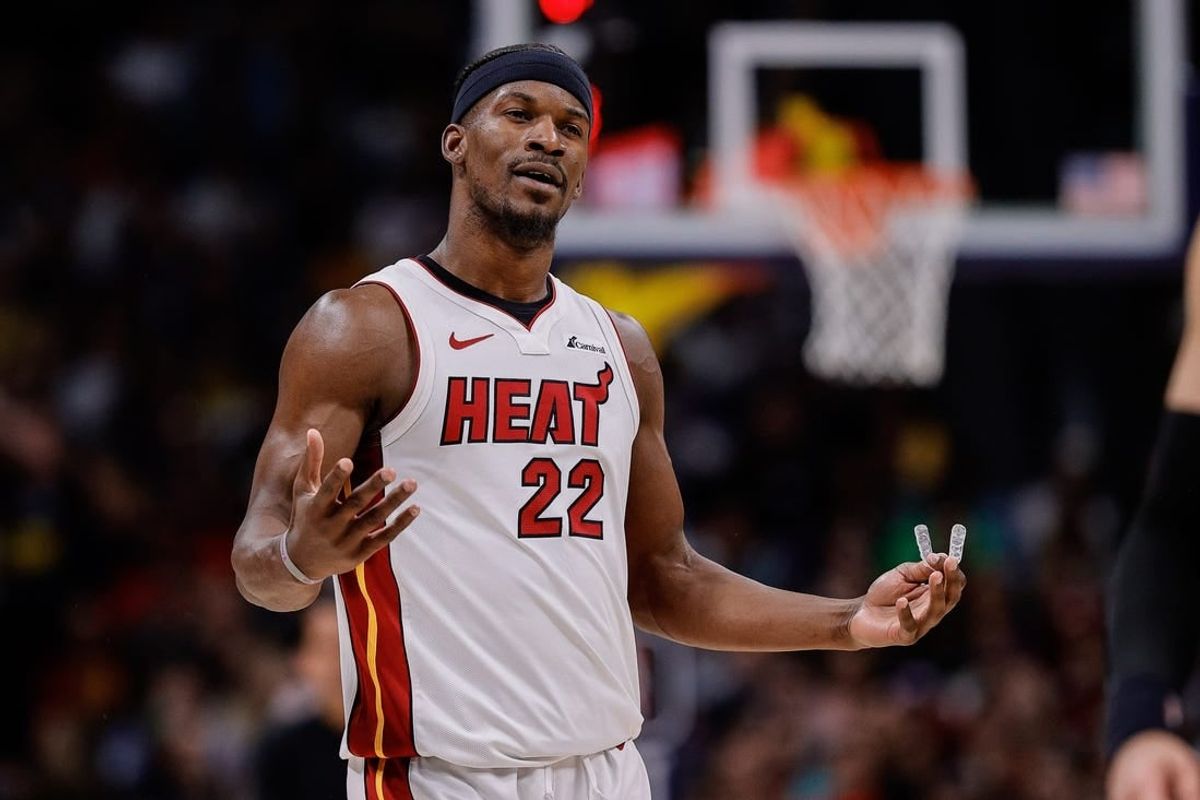 Feb 29, 2024; Denver, Colorado, USA; Miami Heat forward Jimmy Butler (22) reacts after a play in the second quarter against the Denver Nuggets at Ball Arena.
