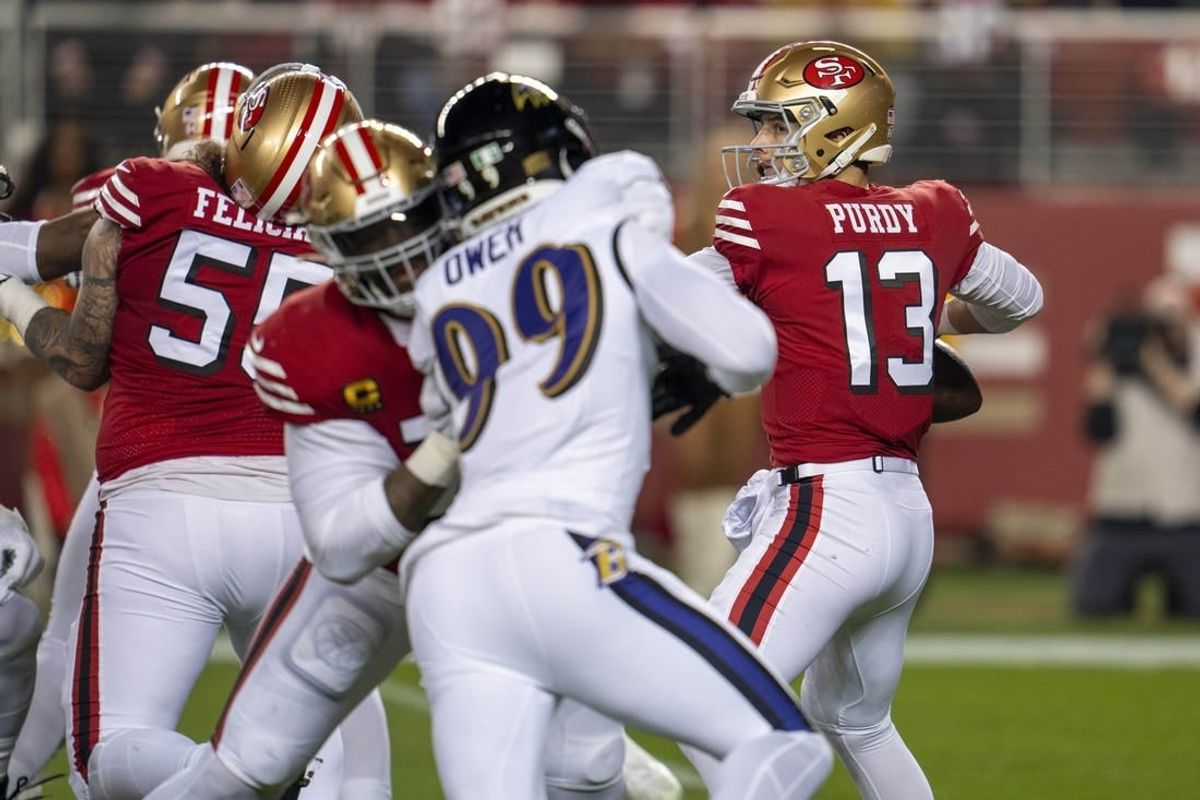 Dec 25, 2023; Santa Clara, California, USA; San Francisco 49ers quarterback Brock Purdy (13) prepares to pass the football against the Baltimore Ravens during the first quarter at Levi's Stadium.