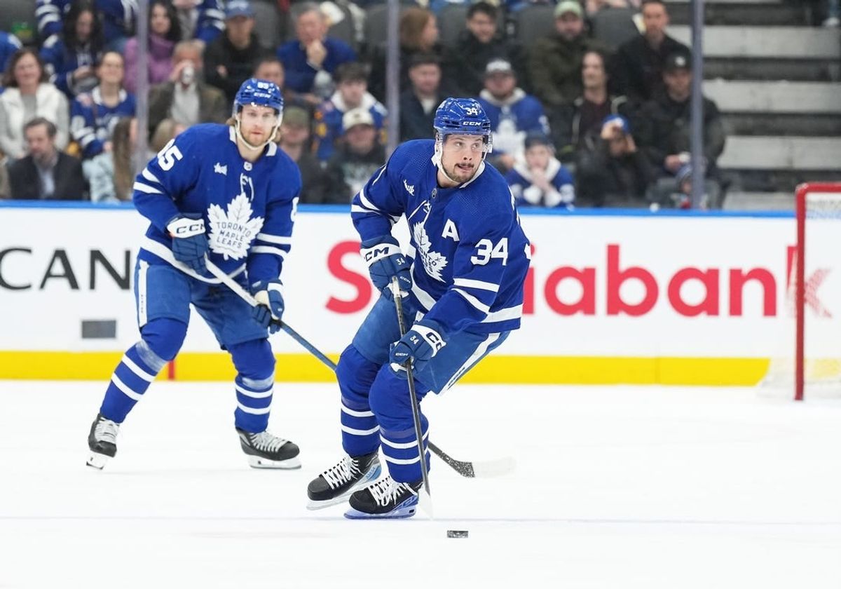 Feb 17, 2024; Toronto, Ontario, CAN; Toronto Maple Leafs center Auston Matthews (34) skates with the puck against the Anaheim Ducks during the first period at Scotiabank Arena.