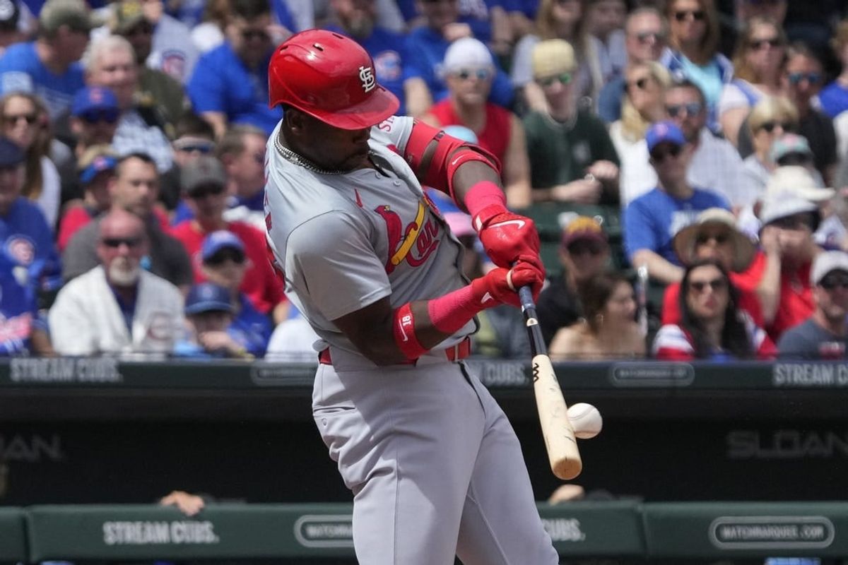 Mar 26, 2024; Mesa, Arizona, USA; St. Louis Cardinals right fielder Jordan Walker (18) hits against the Chicago Cubs in the first inning at Sloan Park.