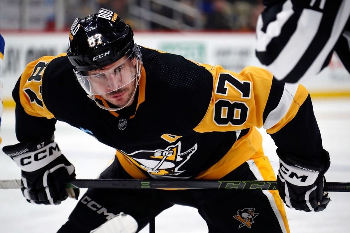 Nov 11, 2023; Pittsburgh, Pennsylvania, USA;  Pittsburgh Penguins center Sidney Crosby (87) prepares to take a face-off against the Buffalo Sabres during the third period at PPG Paints Arena.
