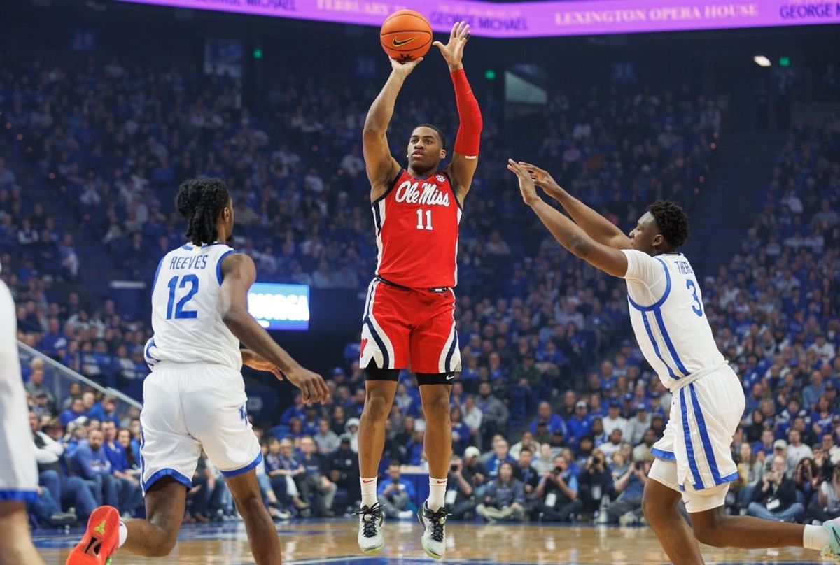 Feb 13, 2024; Lexington, Kentucky, USA; Ole Miss Rebels guard Matthew Murrell (11) makes a three point basket during the first half against the Kentucky Wildcats at Rupp Arena at Central Bank Center.