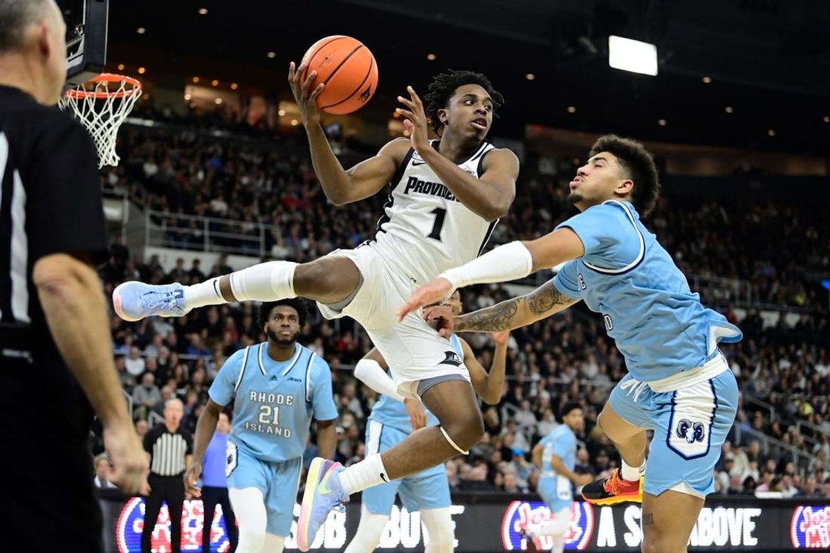 Dec 2, 2023; Providence, Rhode Island, USA; Providence Friars guard Jayden Pierre (1) grabs his own rebound during the first half against the Rhode Island Rams at Amica Mutual Pavilion.