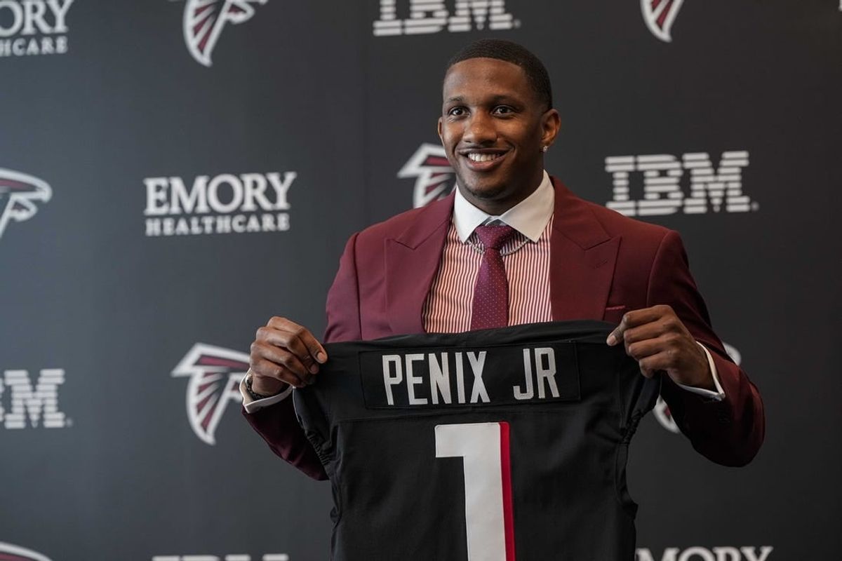 Apr 26, 2024; Flowery Branch, GA, USA; Atlanta Falcons first round draft pick quarterback Michael Penix Jr talks to the media at a press conference introducing him at the Falcons training complex.