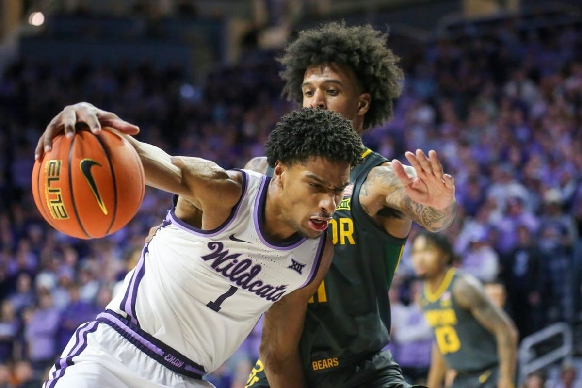 Jan 16, 2024; Manhattan, Kansas, USA; Kansas State Wildcats forward David N'Guessan (1) is guarded by Baylor Bears forward Jalen Bridges (11) during the first half at Bramlage Coliseum.