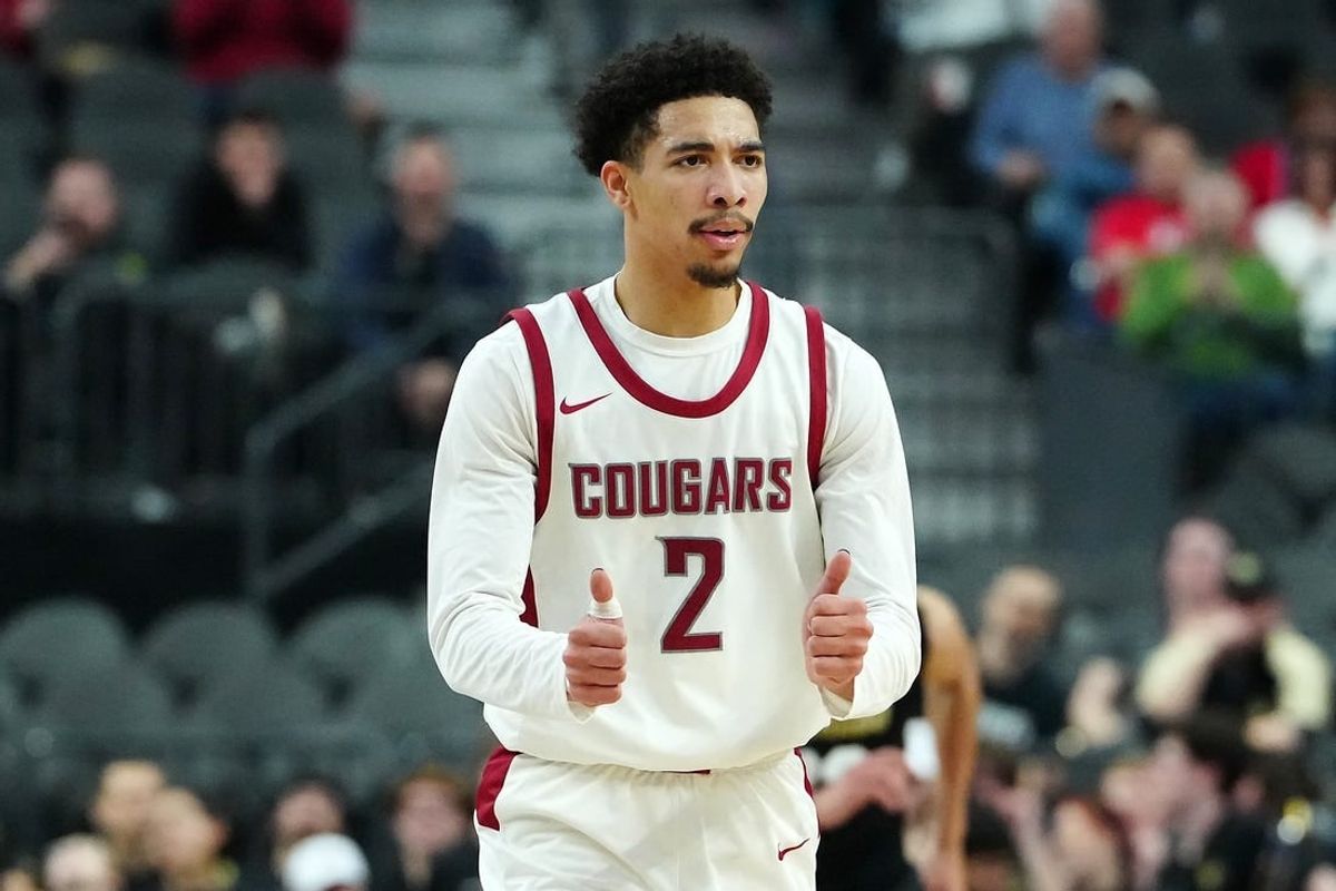 Mar 15, 2024; Las Vegas, NV, USA; Washington State Cougars guard Myles Rice (2) gestures after scoring against the Colorado Buffaloes during the first half at T-Mobile Arena.
