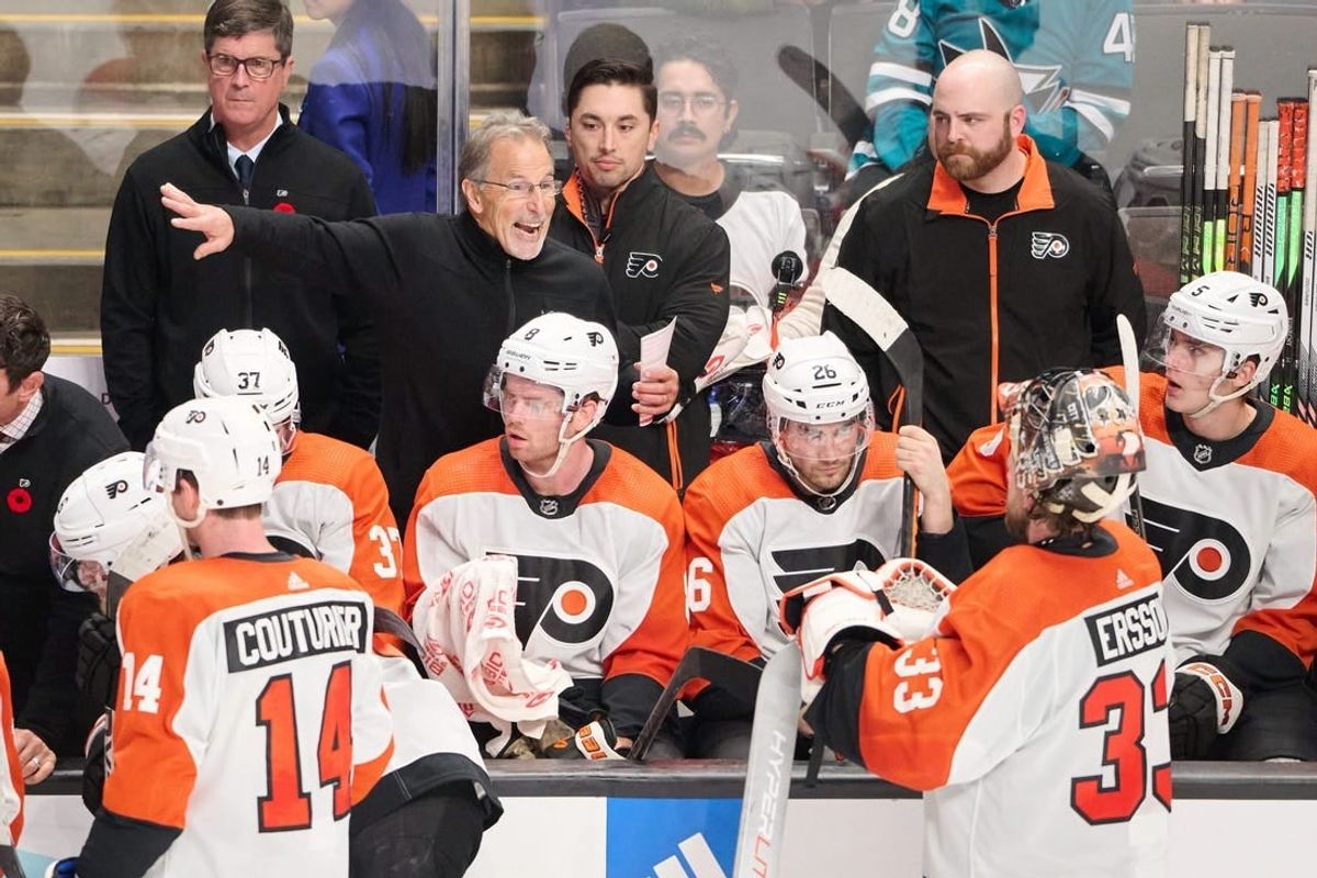 Nov 7, 2023; San Jose, California, USA; Philadelphia Flyers head coach John Tortorella instructs goaltender Samuel Ersson (33) during the third period against the San Jose Sharks at SAP Center at San Jose.