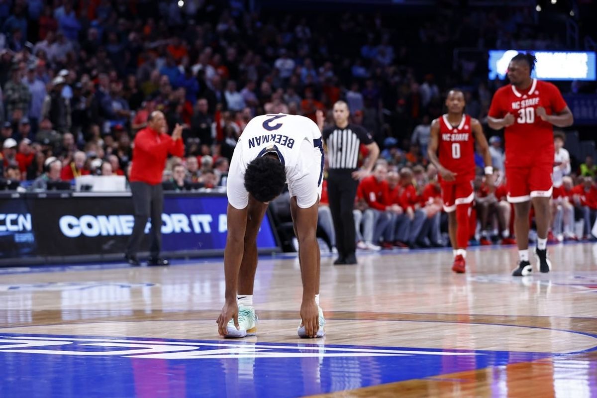 Mar 15, 2024; Washington, D.C., USA; Virginia Cavaliers guard Reece Beekman (2) reacts after missing two free throws in the second half against the North Carolina State Wolfpack at Capital One Arena.