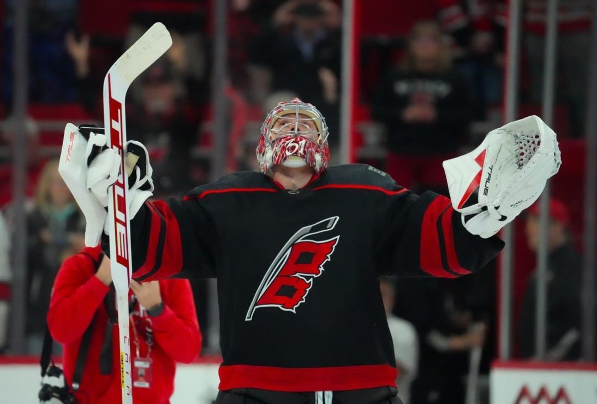 Mar 7, 2024; Raleigh, North Carolina, USA; Carolina Hurricanes goaltender Frederik Andersen (31) celebrates their victory after the game against the Montreal Canadiens at PNC Arena.