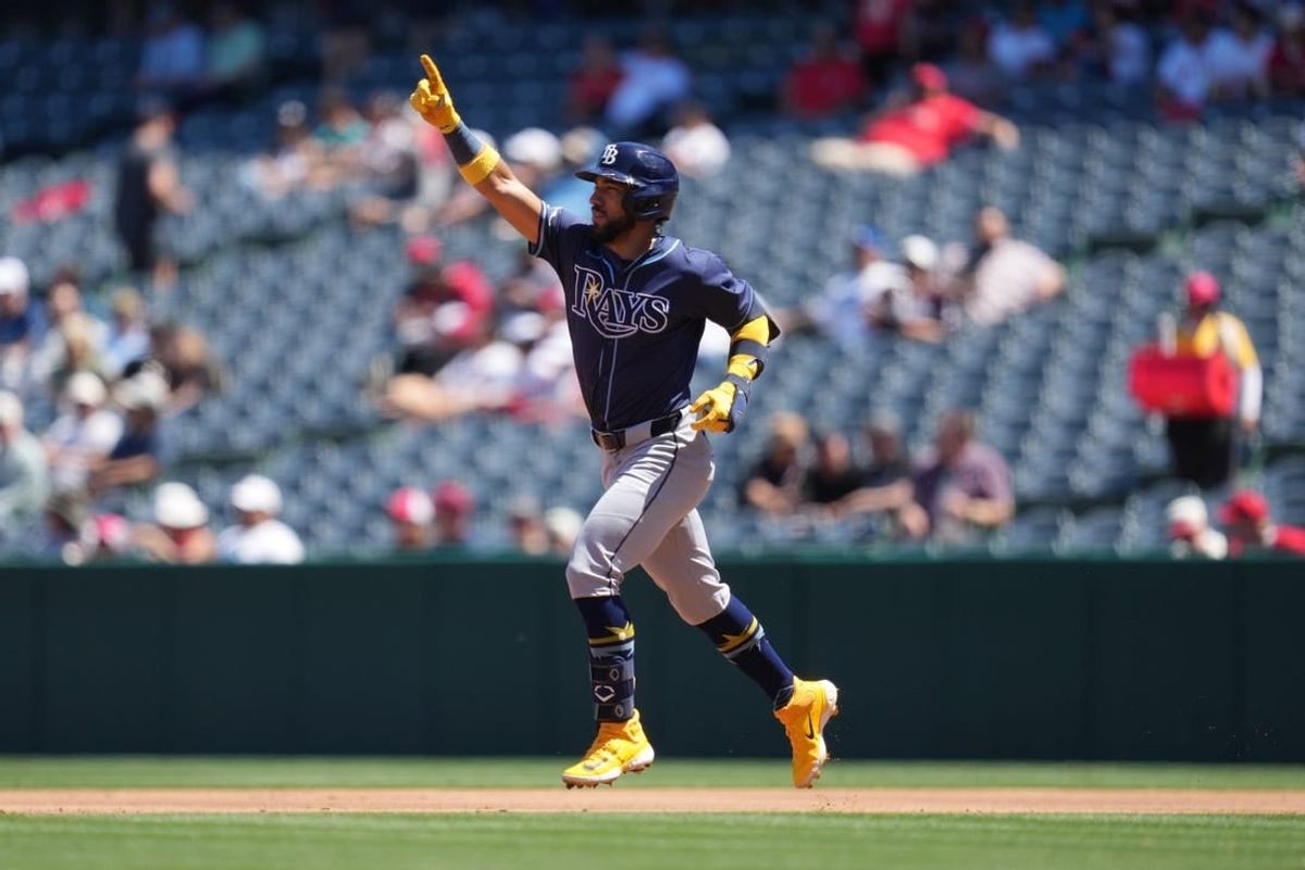 Apr 10, 2024; Anaheim, California, USA; Tampa Bay Rays shortstop Jose Caballero (7) rounds the bases after hitting a home run in the second inning against the Los Angeles Angels at Angel Stadium.