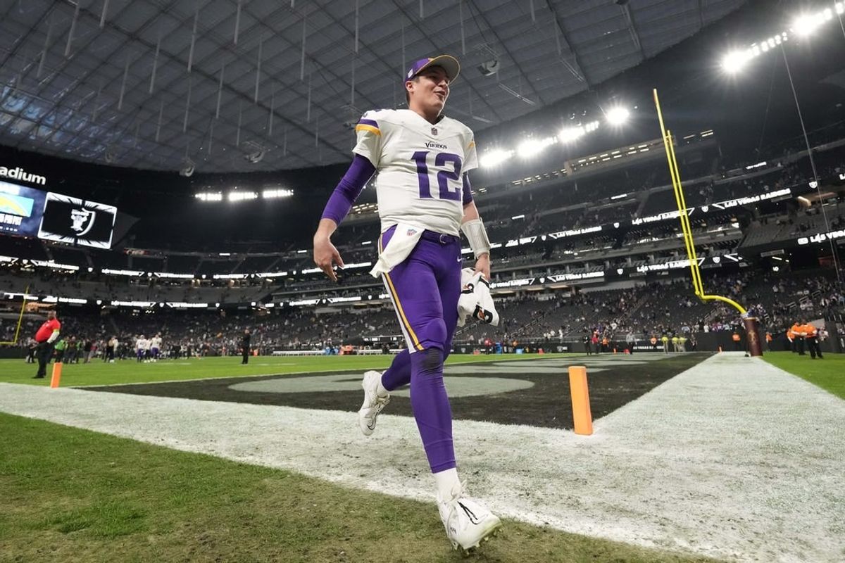 Dec 10, 2023; Paradise, Nevada, USA; Minnesota Vikings quarterback Nick Mullens (12) celebrates after the game against the Las Vegas Raiders at Allegiant Stadium.