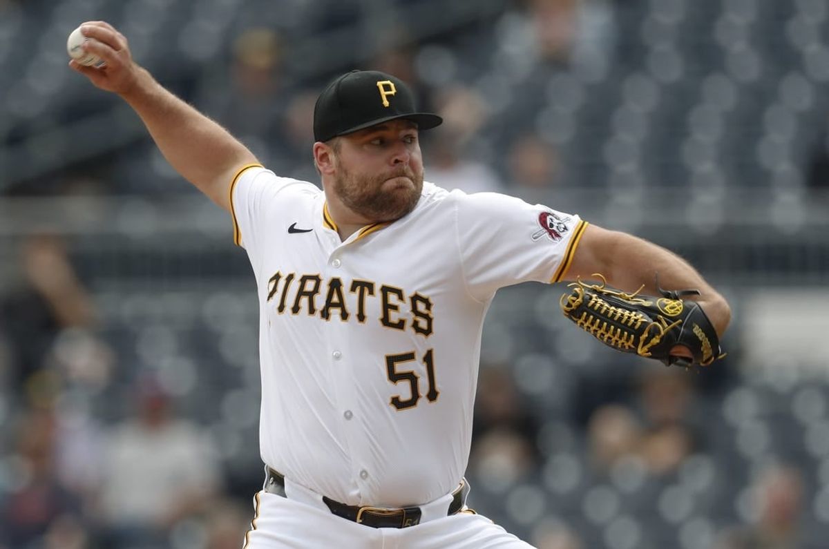 Apr 9, 2024; Pittsburgh, Pennsylvania, USA;  Pittsburgh Pirates relief pitcher David Bednar (51) throws against the Detroit Tigers during the ninth inning at PNC Park. Detroit won 5-3.