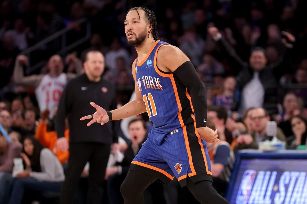 Feb 3, 2024; New York, New York, USA; New York Knicks guard Jalen Brunson (11) celebrates his three point shot against the Los Angeles Lakers during the third quarter at Madison Square Garden.