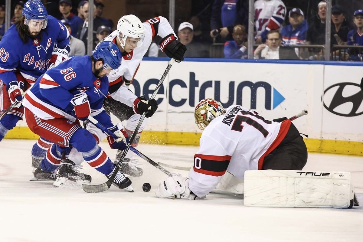 Apr 15, 2024; New York, New York, USA;  Ottawa Senators goaltender Joonas Korpisalo (70) defends the net from a shot on goal attempt by New York Rangers defenseman Erik Gustafsson (56) in the first period at Madison Square Garden.
