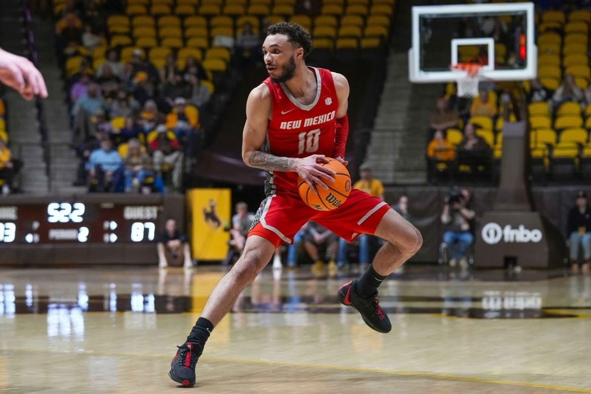 Feb 6, 2024; Laramie, Wyoming, USA; New Mexico Lobos guard Jaelen House (10) looks to pass against the Wyoming Cowboys during the second half at Arena-Auditorium.