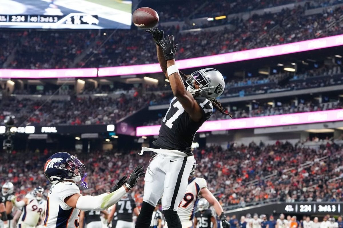 Jan 7, 2024; Paradise, Nevada, USA; Las Vegas Raiders wide receiver Davante Adams (17) misses a pass in the end zone against the Denver Broncos during the fourth quarter at Allegiant Stadium.