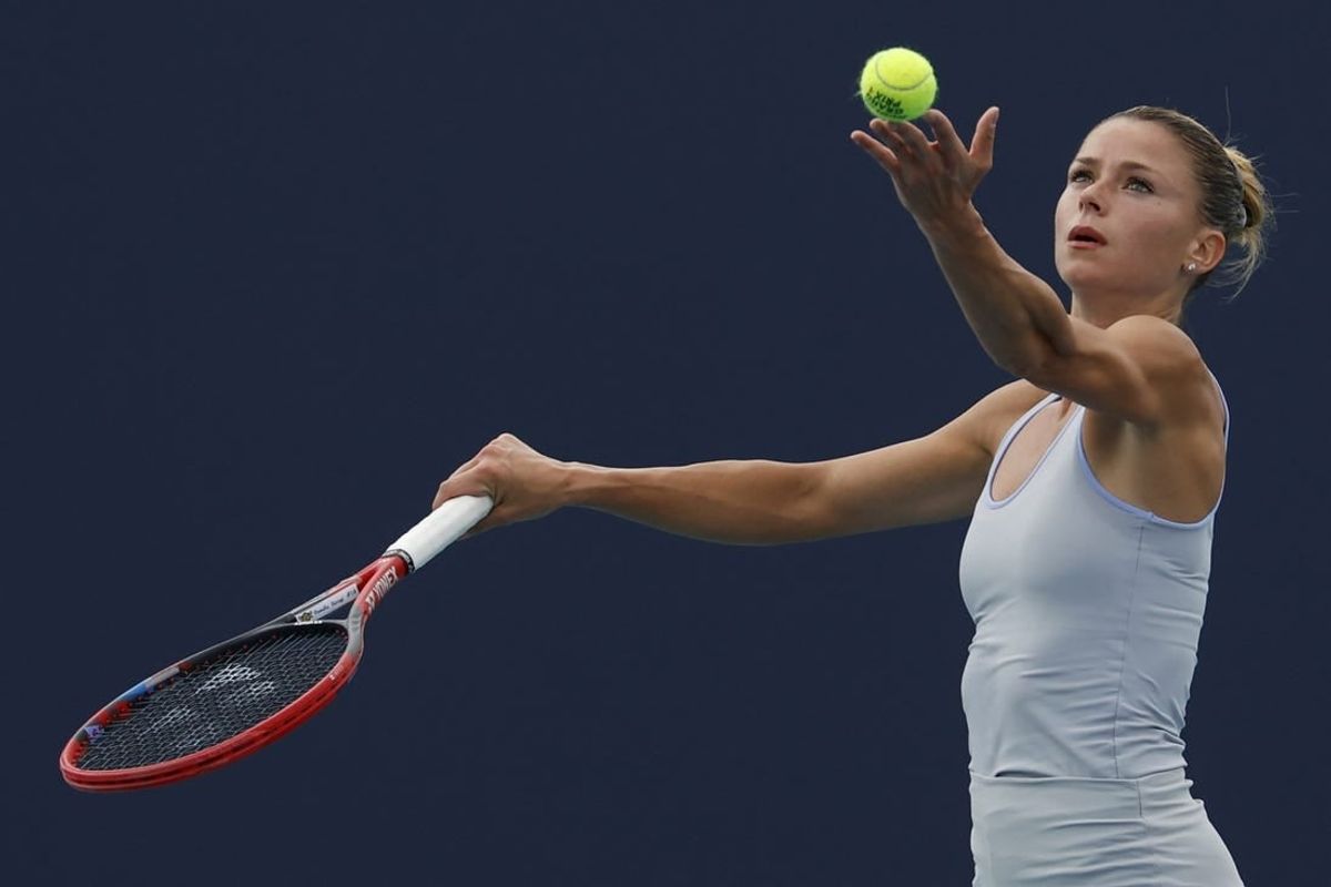 Mar 20, 2024; Miami Gardens, FL, USA; Camila Giorgi (ITA) serves against Magdalena Frech (POL) (not pictured) on day three of the Miami Open at Hard Rock Stadium.