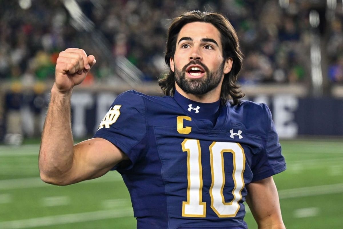 Nov 18, 2023; South Bend, Indiana, USA; Notre Dame Fighting Irish quarterback Sam Hartman (10) exhorts the crowd in the fourth quarter against the Wake Forest Demon Deacons at Notre Dame Stadium.