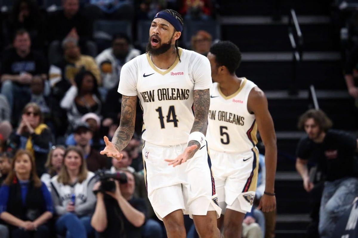 Feb 12, 2024; Memphis, Tennessee, USA; New Orleans Pelicans forward Brandon Ingram (14) reacts during the first half against the Memphis Grizzlies at FedExForum.