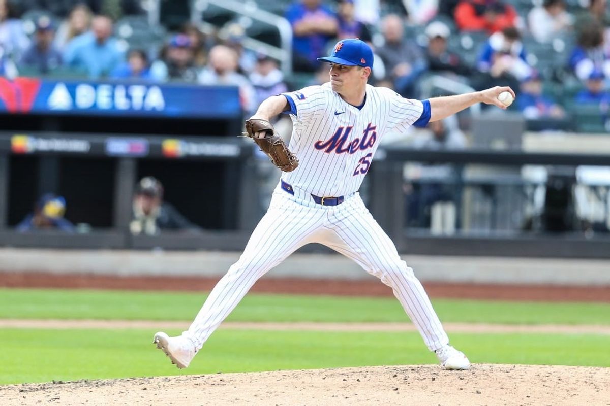 Mar 31, 2024; New York City, New York, USA;  New York Mets relief pitcher Brooks Raley (25) pitches in the ninth inning against the Milwaukee Brewers at Citi Field.