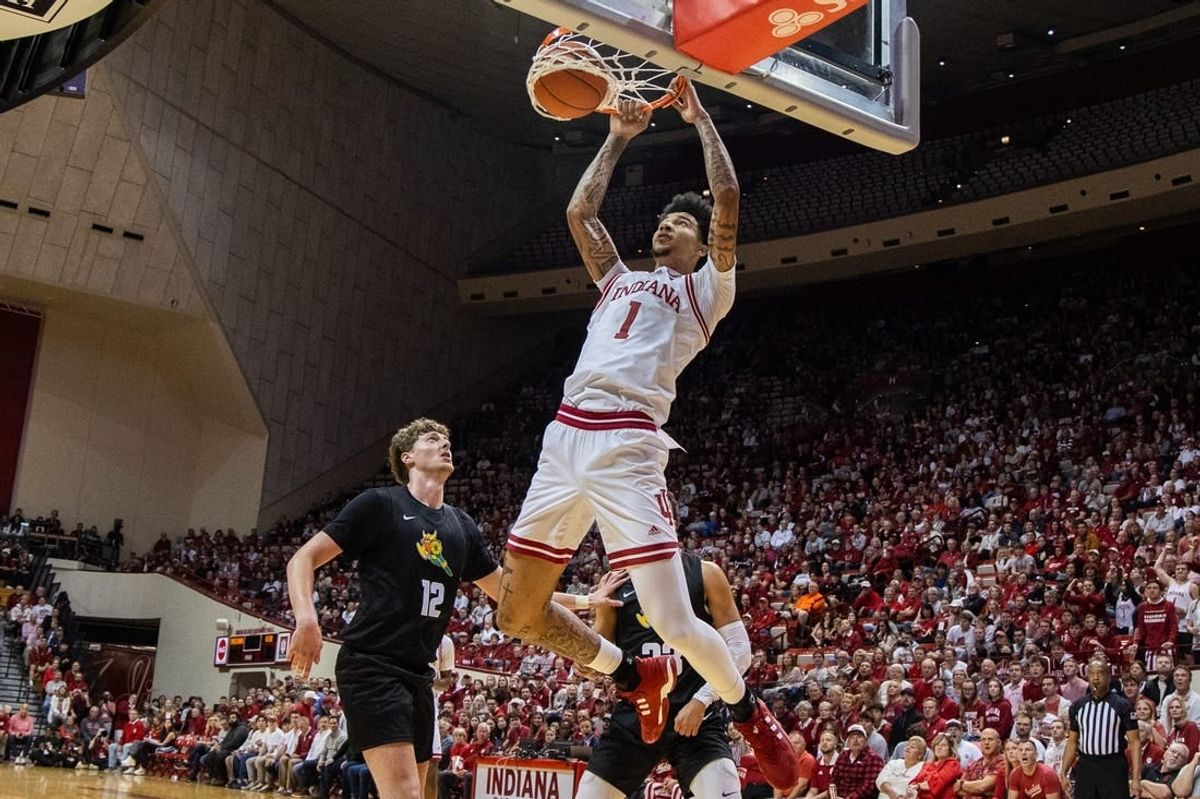 Nov 16, 2023; Bloomington, Indiana, USA; Indiana Hoosiers center Kel'el Ware (1) shoots the ball while Wright State Raiders center AJ Braun (12) defends in the first half at Simon Skjodt Assembly Hall.