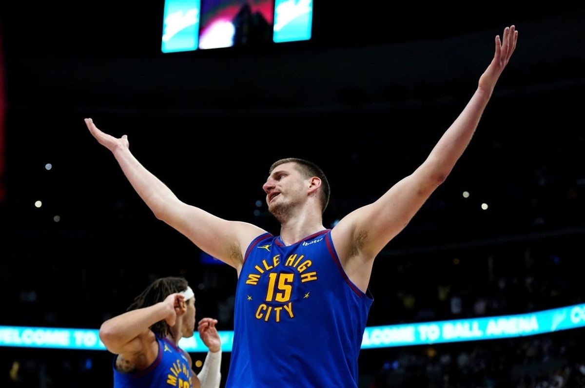 Mar 5, 2024; Denver, Colorado, USA; Denver Nuggets center Nikola Jokic (15) reacts to a foul in the second half against the Phoenix Suns at Ball Arena.