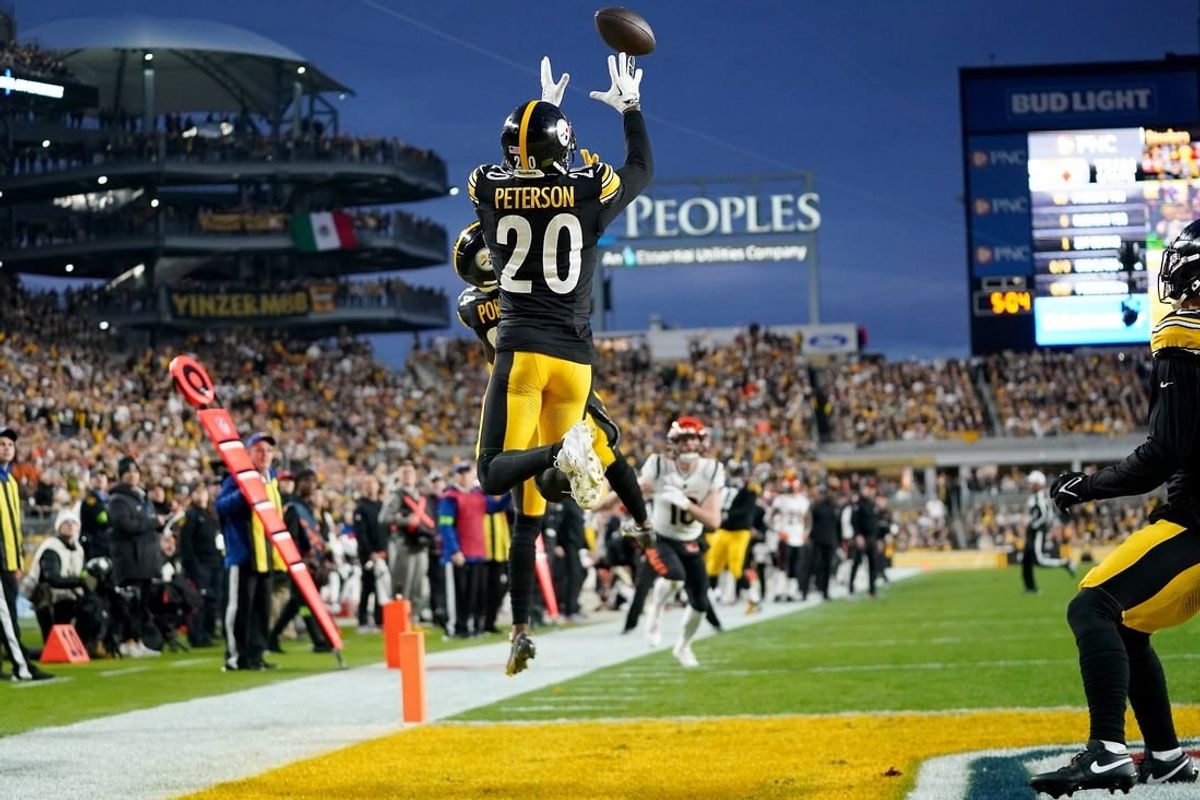 Dec 23, 2023; Pittsburgh, PA, USA; Pittsburgh Steelers cornerback Patrick Peterson (20) intercepts a pass in the first quarter during a Week 16 NFL football game between the Cincinnati Bengals and the Pittsburgh Steelers at Acrisure Stadium.